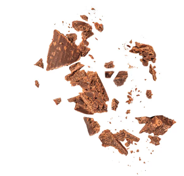 Flying Grated Chocolate Stukken Geïsoleerd Witte Achtergrond Gemalen Pure Chocolade — Stockfoto