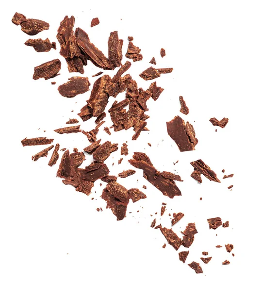 Uçan Izgara Çikolata Parçaları Beyaz Arka Planda Izole Edilmiş Ezilmiş — Stok fotoğraf