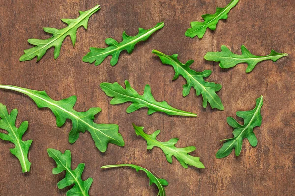 Ruccola Blad Houten Tafel Fris Groen Arugula Bladeren Collectie Bovenaanzicht — Stockfoto