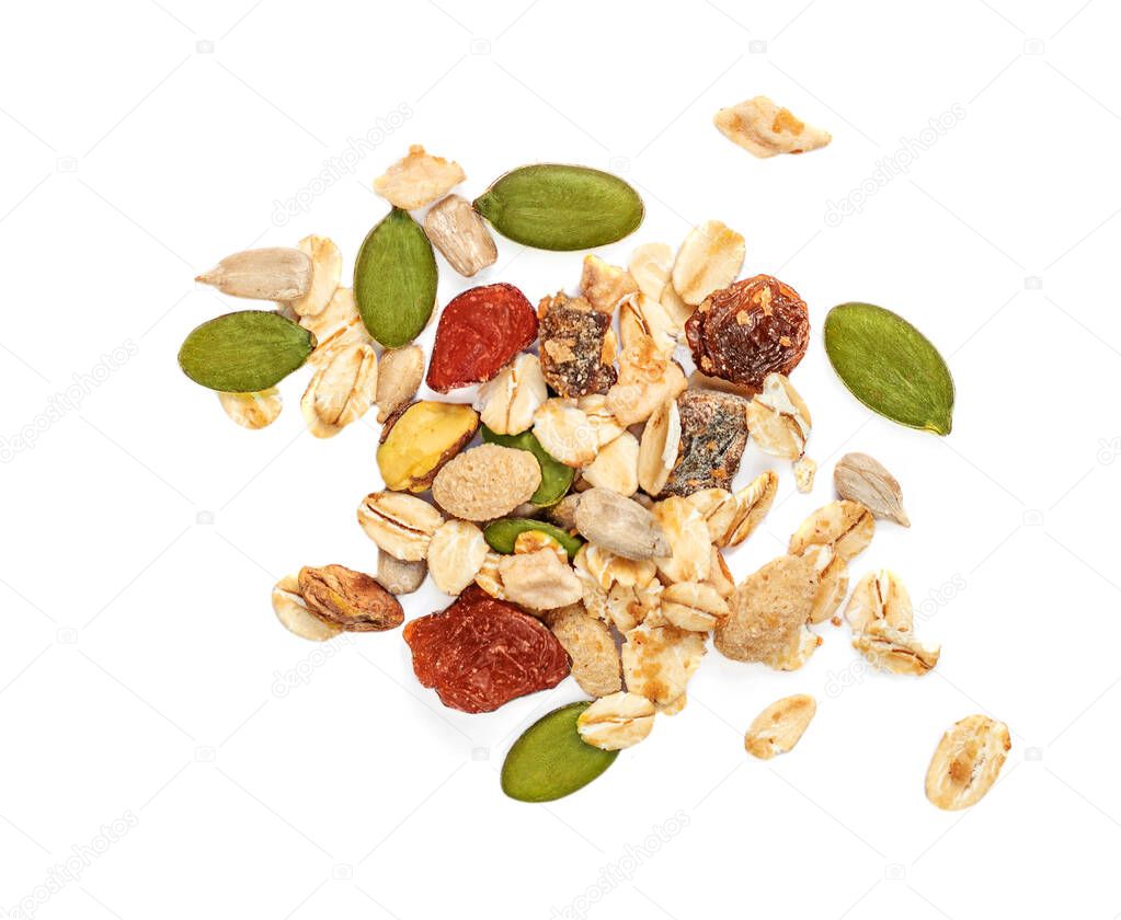 Muesli with Nuts, seeds and dried fruits isolated on white background. Flat lay. Top vie