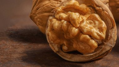  Walnuts on a wooden table.  Walnut fresh nuts Background top vie