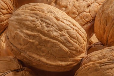 Walnuts kernels as a background, Whole walnut close up, organic  food concep