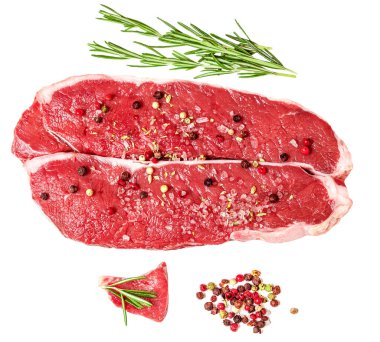 Fresh beef steak isolated on white background, top view. Raw meat fillet with spices and herb