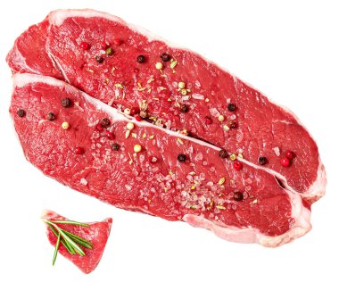 Fresh beef steak isolated on white background, top view. Raw meat fillet with spices and herb