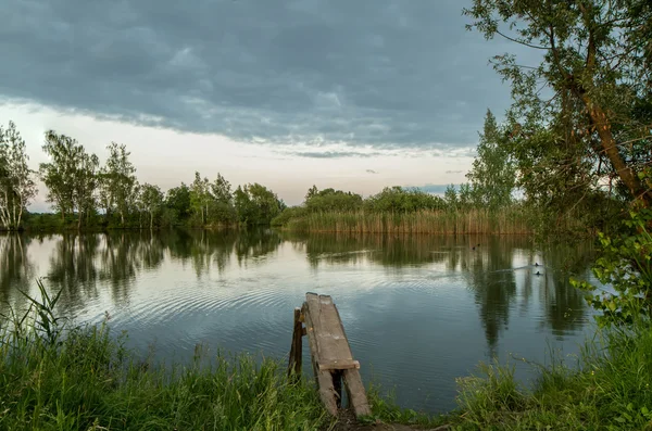 Footbridge in lake — Stock Photo, Image