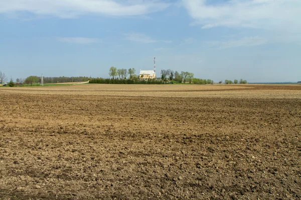 Spring plowed field — Stock Photo, Image