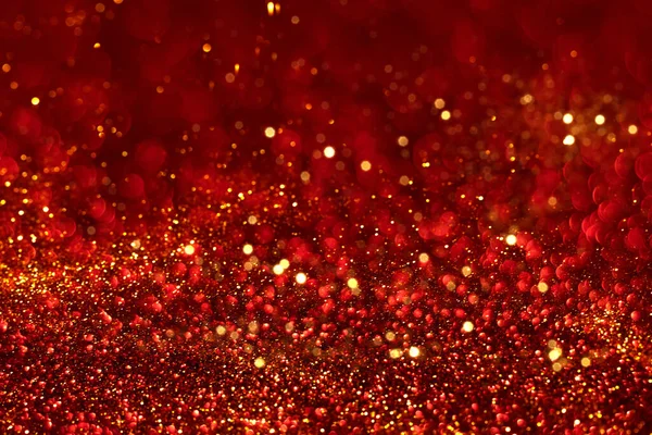 Rött och gyllene glitter bokeh bakgrund — Stockfoto
