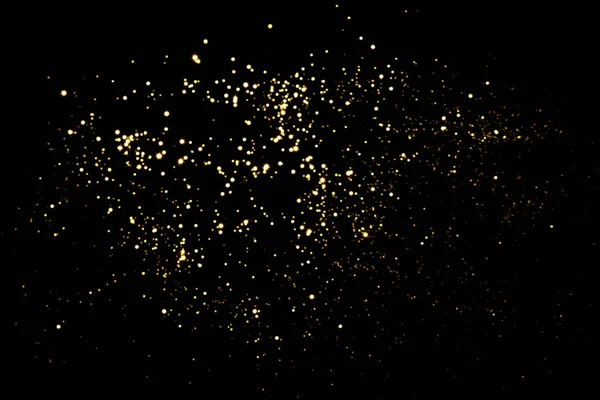 Золотой размытый боке огни на черном фоне — стоковое фото