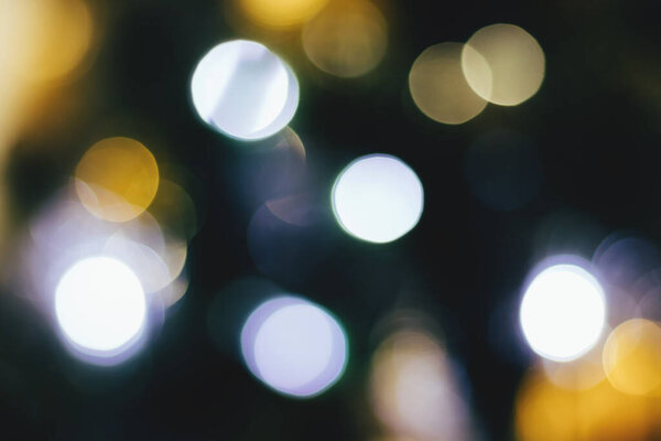 Blurred lights abstract background. Christmas holiday defocused bokeh