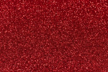 Parlak kırmızı arka plan, soyut parlak noel dokusu. Tatil ışıkları