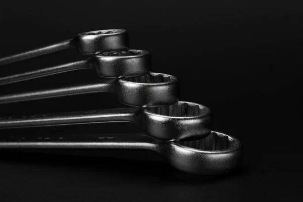 Wrenches on black background — Stock Photo, Image