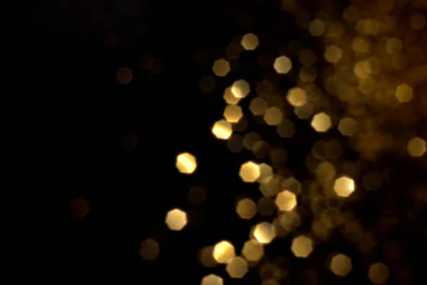 Luzes Bokeh Embaçadas Douradas Fundo Preto Brilho Brilham Estrelas Para — Fotografia de Stock