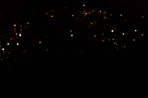Zlaté Rozmazané Bokeh Světla Černém Pozadí Třpytivé Třpytivé Hvězdy Oslavě — Stock fotografie
