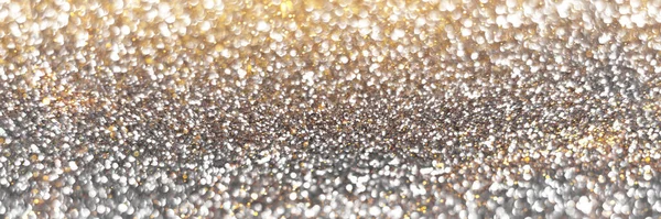 シルバーとゴールデンの輝く輝きボケの背景バナー — ストック写真