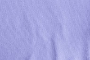 2022 yılının modaya uygun renk konsepti, menekşe mavisi, lavanta rengi pamuk kumaş dokusu. Tekstil arkaplanı