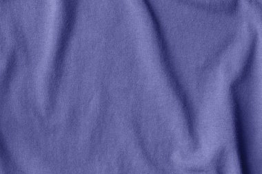 2022 yılının modaya uygun renk konsepti, menekşe mavisi, lavanta rengi pamuk kumaş dokusu. Tekstil buruşmuş arkaplan