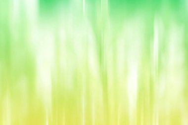 Yaz yeşili bulanık arkaplan. Karışık hareket dokusu. Soyut köşegen çizgiler duvar kağıdı