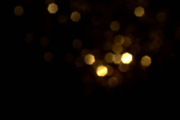 Luces Bokeh Borrosas Doradas Sobre Fondo Negro Glitter Estrellas Brillo —  Fotos de Stock
