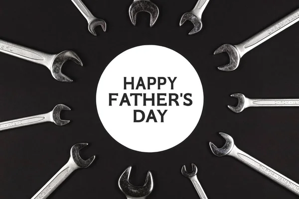 Wrenches on black background. Happy fathers day concept — 图库照片