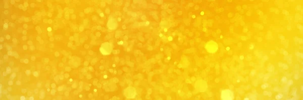 Bright yellow sparkling glitter bokeh background banner — Stock Photo, Image