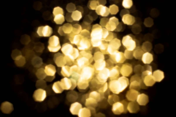 Golden Blurred Bokeh Lights Black Background Glitter Sparkle Stars Celebrate — Stock Photo, Image