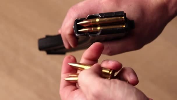 Male Hands Loading Kalashnikov Assault Rifle Magazine Cartridges Load Magazine — Vídeo de stock