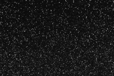 Gri, parlak, ışıl ışıl bir arka plan, noel soyut, parlak bir doku. Tatil ışıkları yanacak. Kutlamak için karlı, parlak yıldızlar.