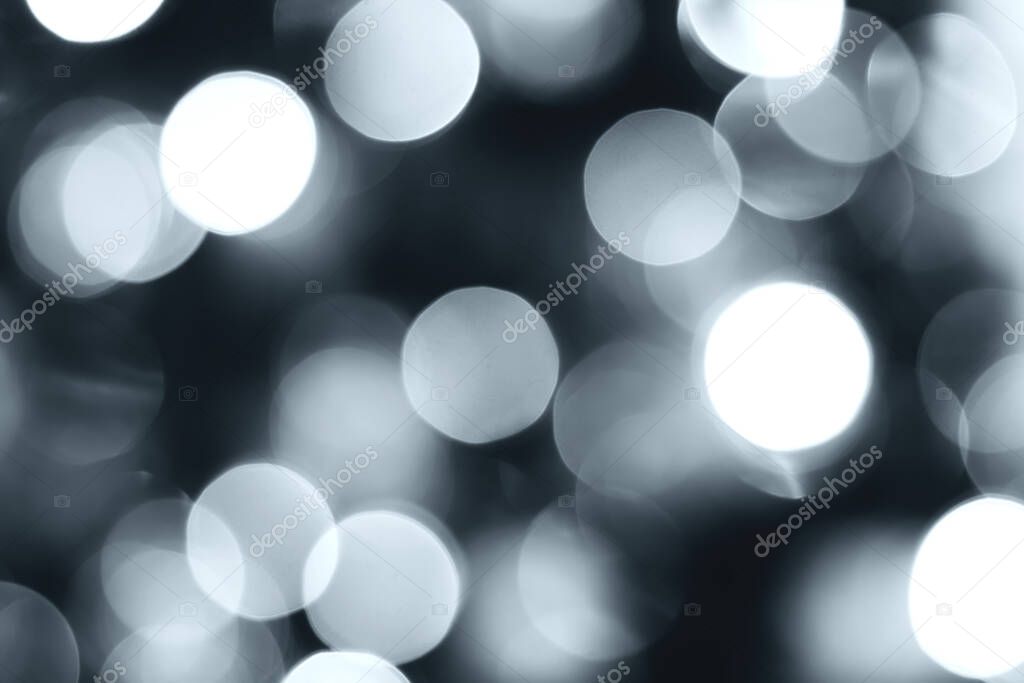 Blurred lights, gray, deep blue background. Abstract bokeh with soft light