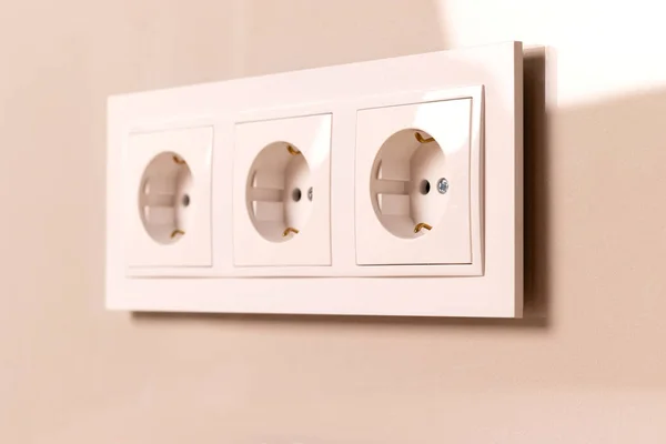 Group White European Electrical Outlets Modern Beige Wall Selective Focus — Foto de Stock