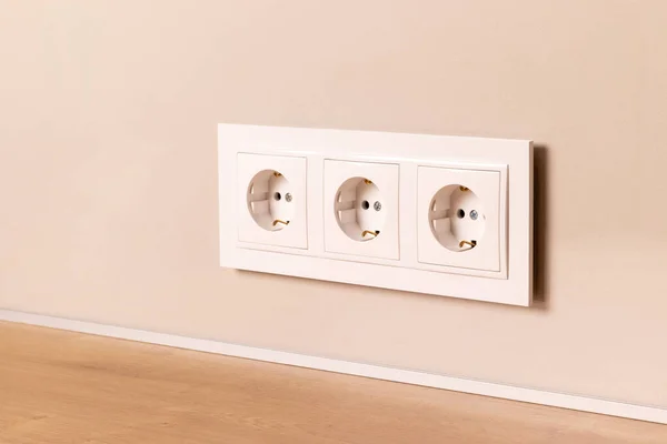 Group White European Electrical Outlets Modern Beige Wall Selective Focus —  Fotos de Stock