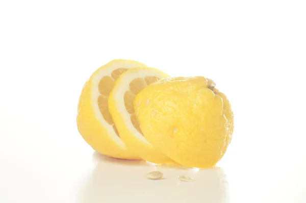 Sliced lemon isolated on white — Stock Photo, Image