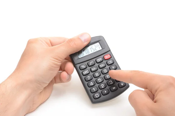 Man counting on calculator — Stock Photo, Image