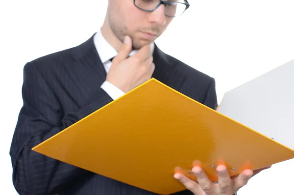 Young businessman with file binder — Stock Photo, Image