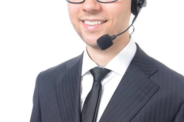 Young male call center operator in suit — Stock Photo, Image