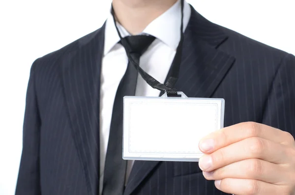 Young businessman with identification card — Stock Photo, Image