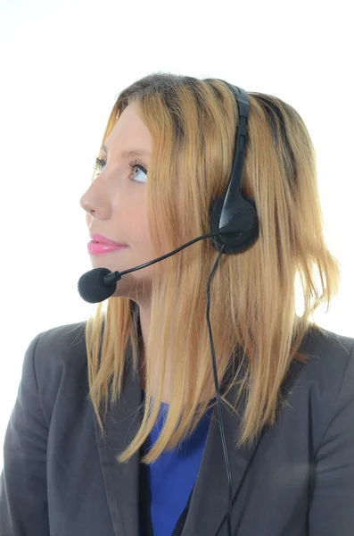 Portret van jonge vrouwelijke call center operator — Stockfoto