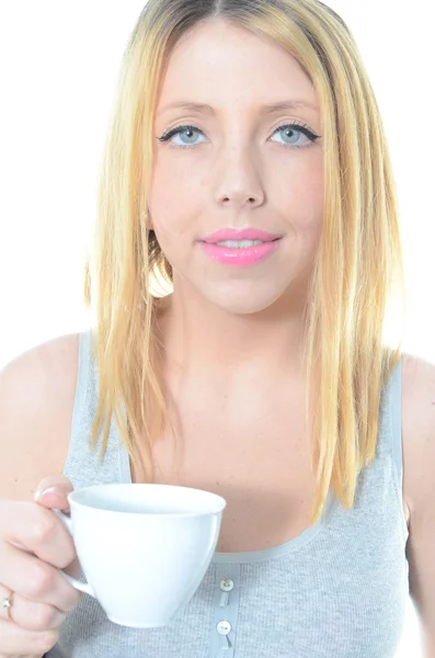 Portrait of young woman drinking coffee — Stock Photo, Image