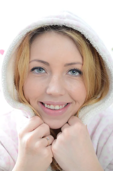 Beautiful young woman in bathrobe — Stock Photo, Image