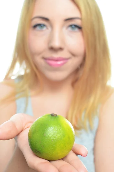 Young woman with sliced lime — Stock Photo, Image