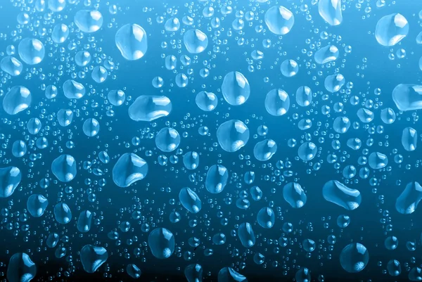 Big and small water drops — Stock Photo, Image