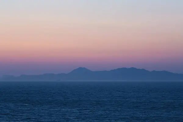 Захід Сонця Місті Родос Вигляд Силуету Острова Сімі — стокове фото