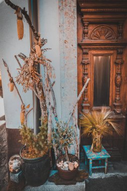 Rural decoration of front door. Cozy vintage things, aesthetic photo