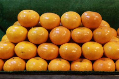 pile of mandarins at local market