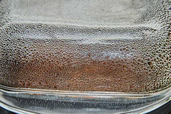 Tekstura kropli na pokrywie szklanej z selektywną ostrością, tło — Zdjęcie stockowe