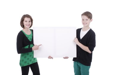 Portrait of a boy and a girl with a white placard
