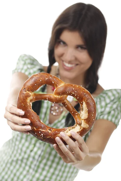Happy woman with traditional blouse and pretzel — Stock Photo, Image