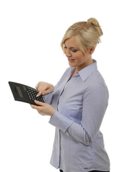 Kvinna med tabell calculater — Stockfoto