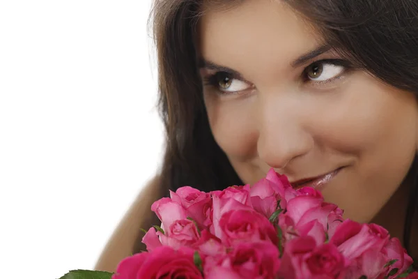 Attractive woman with a bunch of pink roses - love - Valentines day Stock Image
