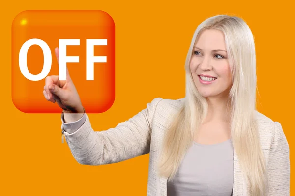Donna tocca un bottone arancione — Foto Stock