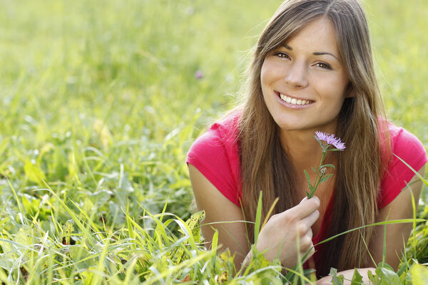 Attractive woman enjoys summer outdoor